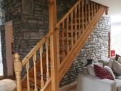 living room with wooden staircase